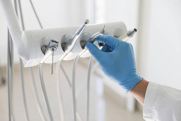 Professional Tooth Extraction technician working in West Laurel, MD